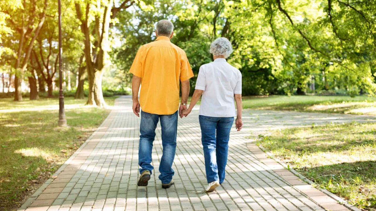 couple on a Romantic walk through the park.