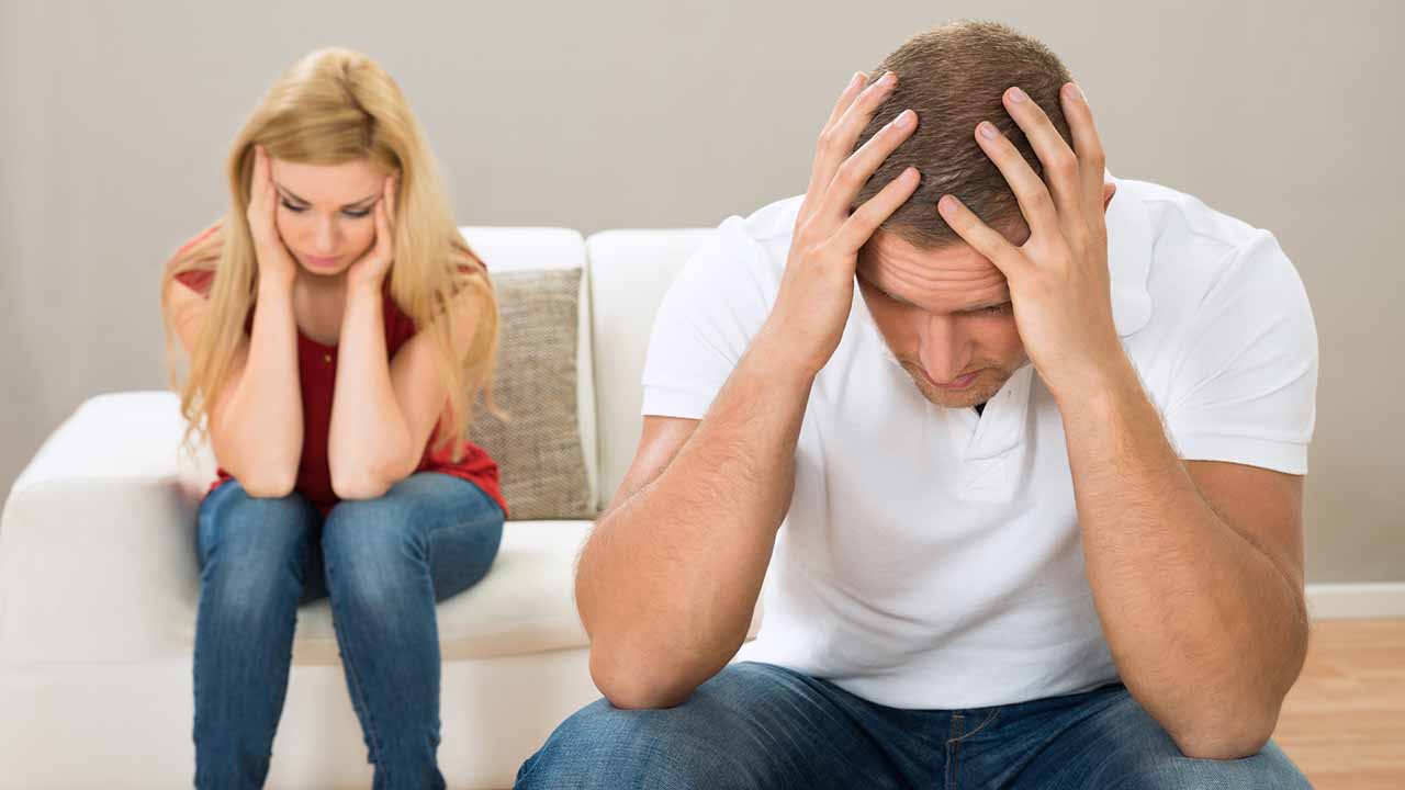 couple distraught about conversation, needing to take a time out.