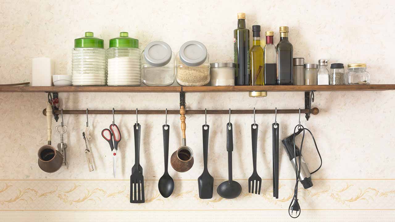 hanging hooks in kitchen for various utensils.